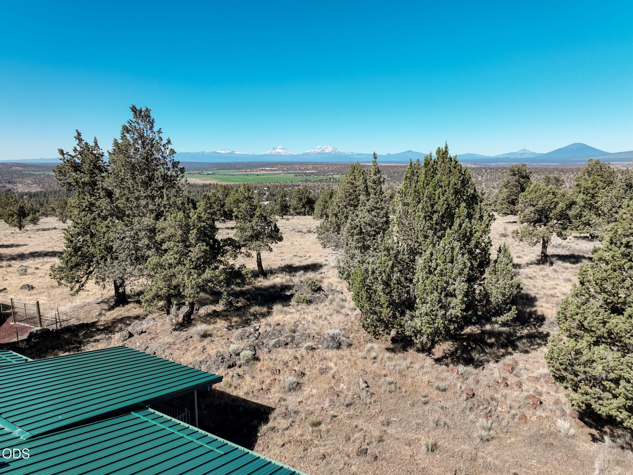 8628 Southwest Crater Loop Road Terrebonne, OR 97760 - Photo 34 of 36 a view of a yard with wooden fence