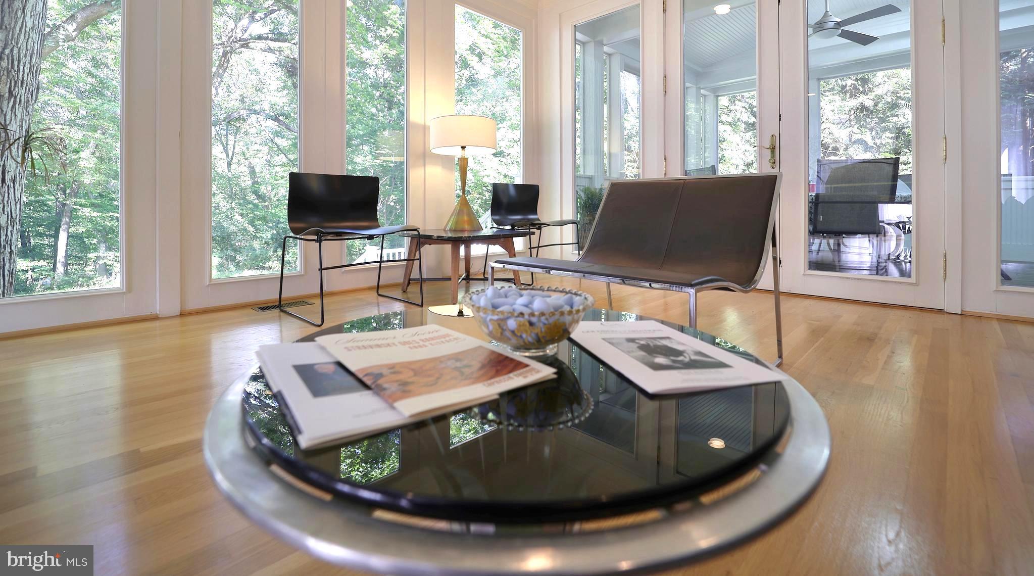 3137 Aberfoyle Place Northwest Washington, DC 20015 - Photo 14 of 85 a living room with furniture and a flat screen tv