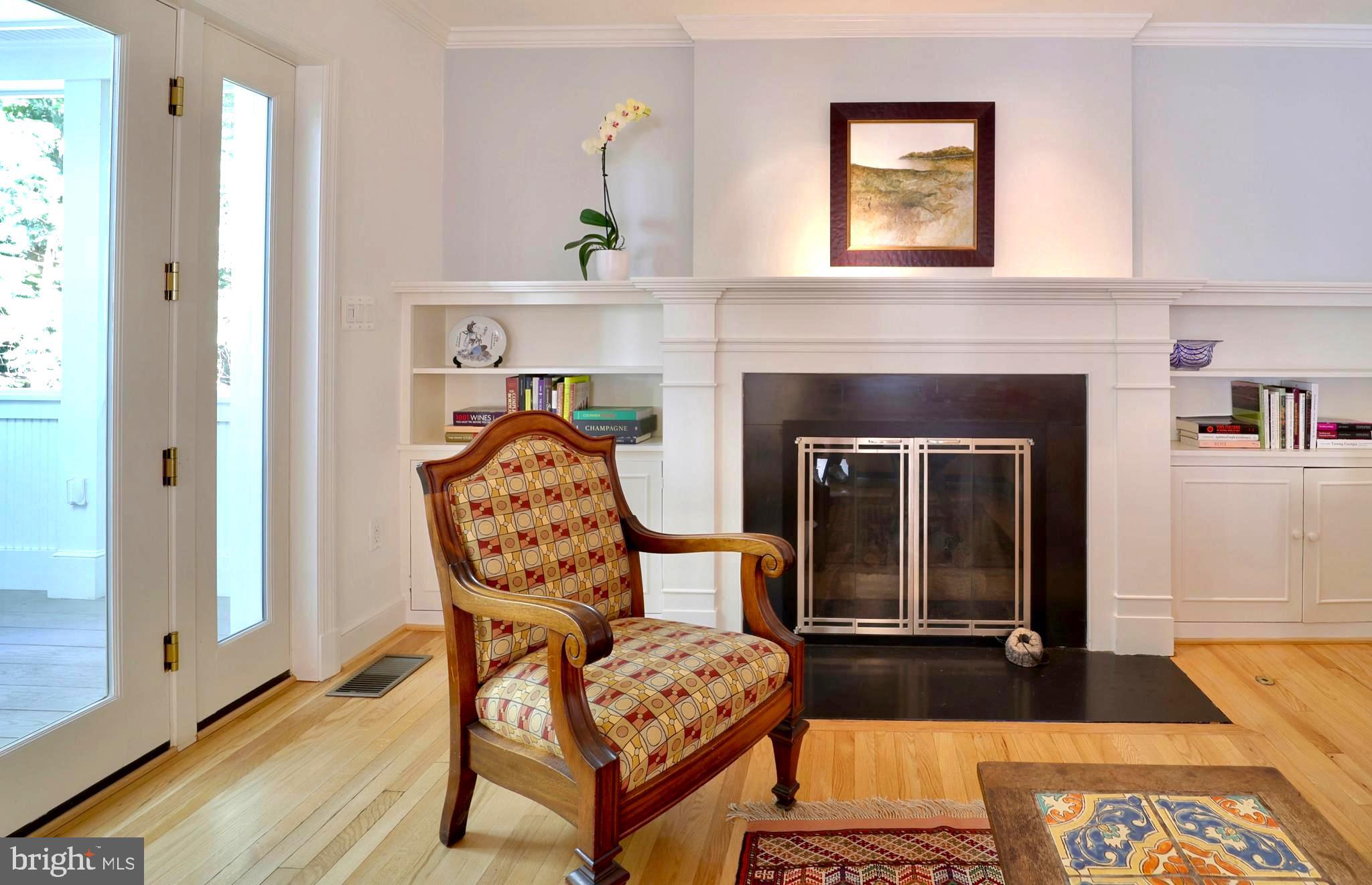3137 Aberfoyle Place Northwest Washington, DC 20015 - Photo 15 of 85 a living room with furniture and a fireplace