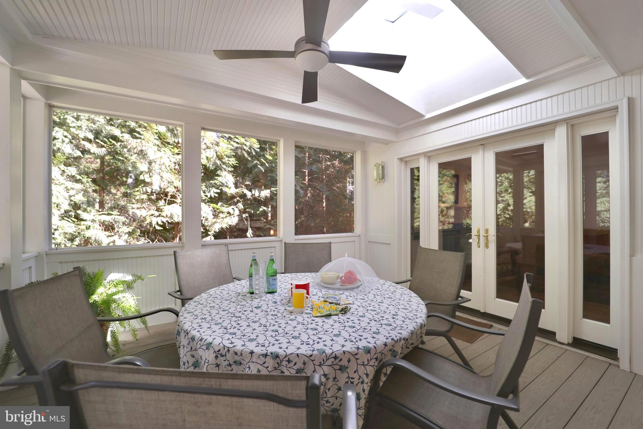 3137 Aberfoyle Place Northwest Washington, DC 20015 - Photo 17 of 85 a view of a dining room with furniture window and outside view
