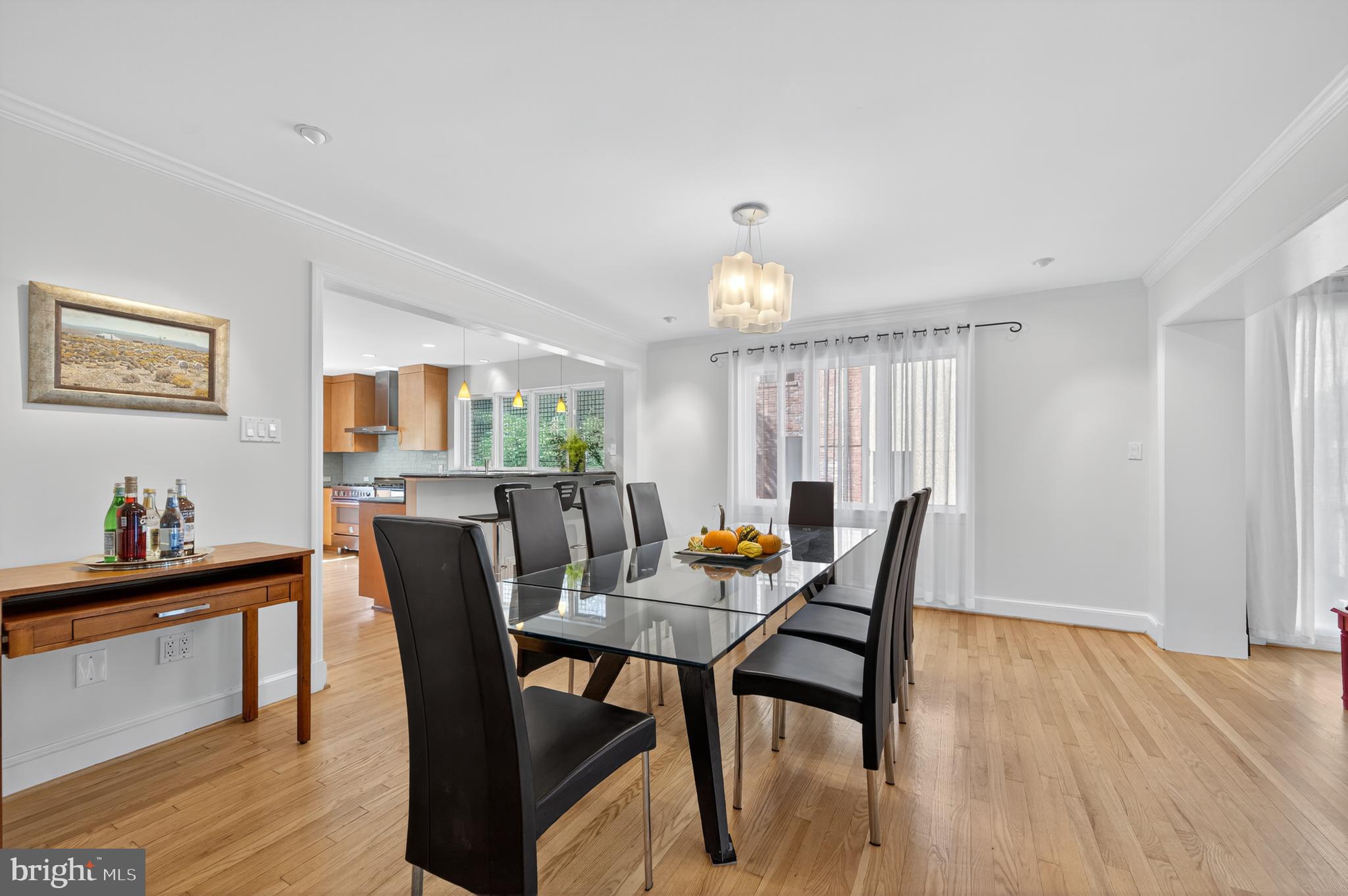 3137 Aberfoyle Place Northwest Washington, DC 20015 - Photo 20 of 85 a view of a dining room with furniture and wooden floor