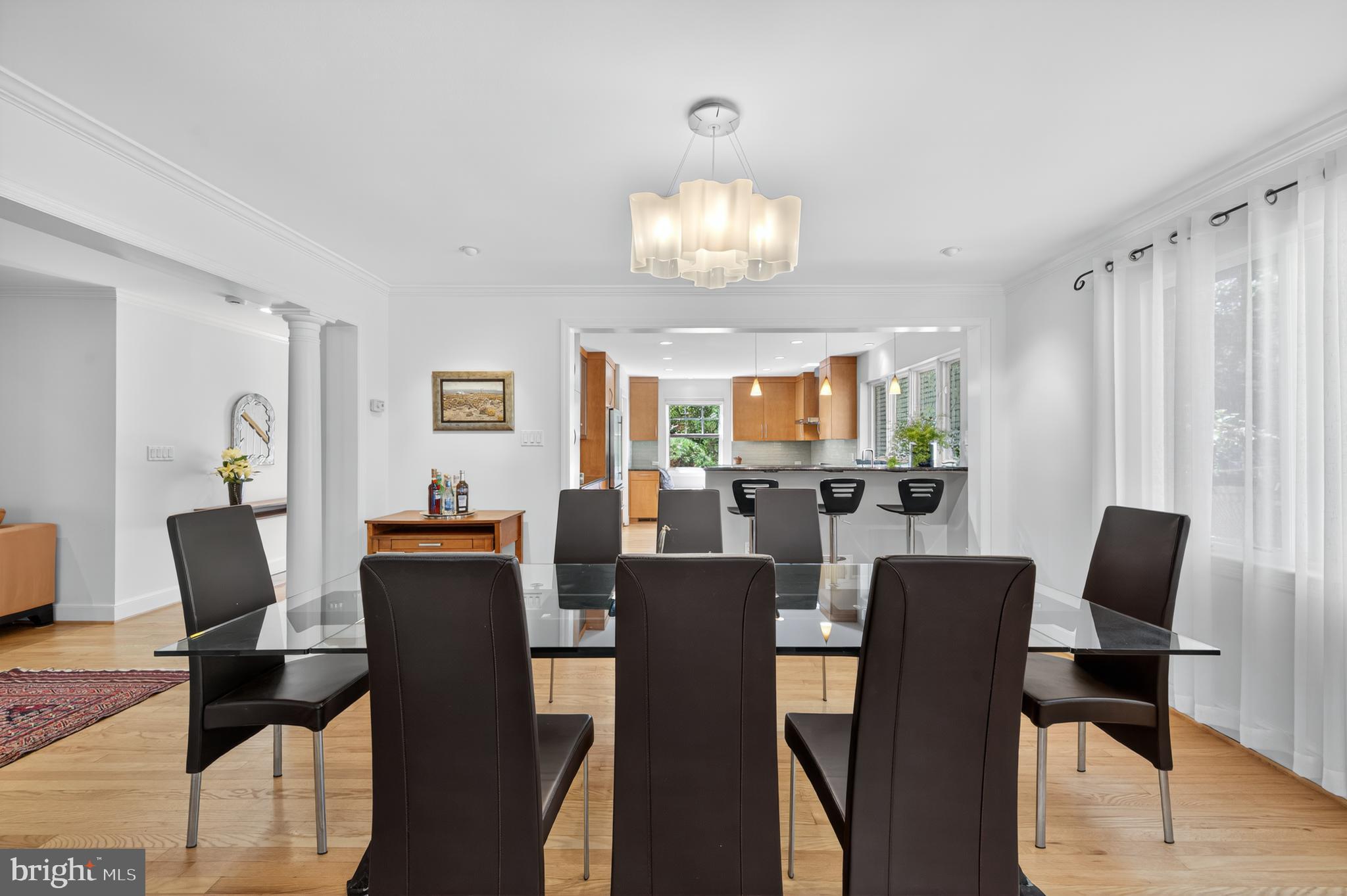 3137 Aberfoyle Place Northwest Washington, DC 20015 - Photo 21 of 85 a view of a dining room with furniture window and wooden floor