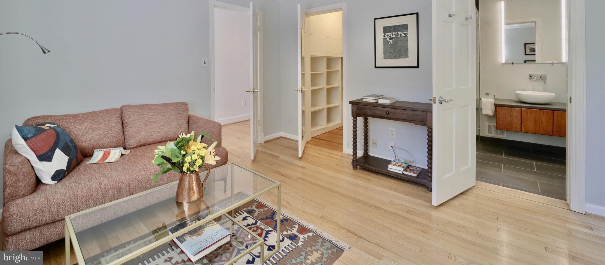 3137 Aberfoyle Place Northwest Washington, DC 20015 - Photo 36 of 85 a living room with furniture flowerpot and wooden floor