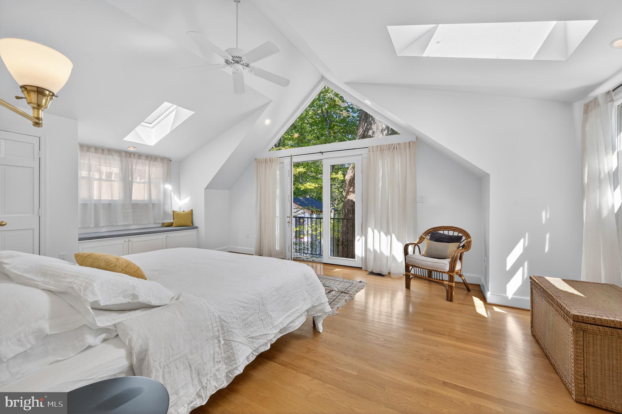 3137 Aberfoyle Place Northwest Washington, DC 20015 - Photo 41 of 85 a spacious bedroom with a bed and a chair