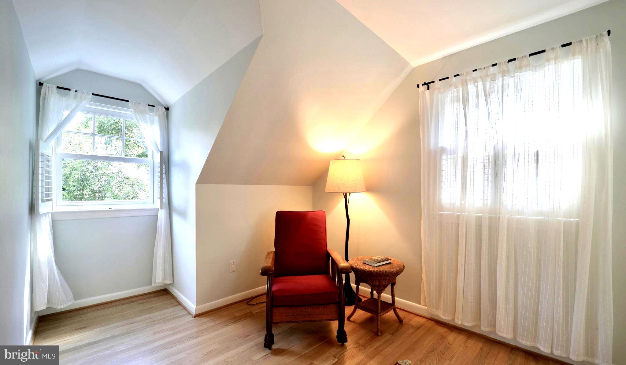 3137 Aberfoyle Place Northwest Washington, DC 20015 - Photo 53 of 85 a chair and a table in a room