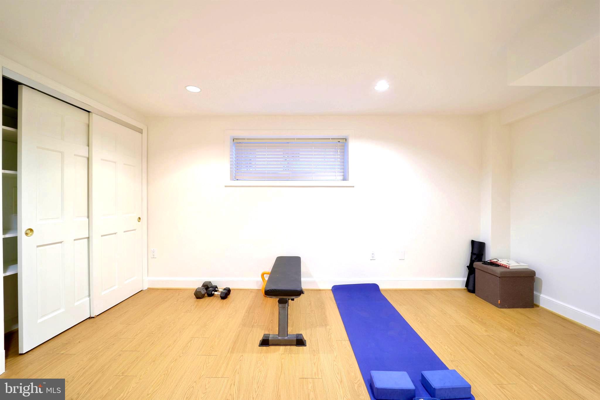 3137 Aberfoyle Place Northwest Washington, DC 20015 - Photo 69 of 85 a bedroom with a bed and a painting on the wall
