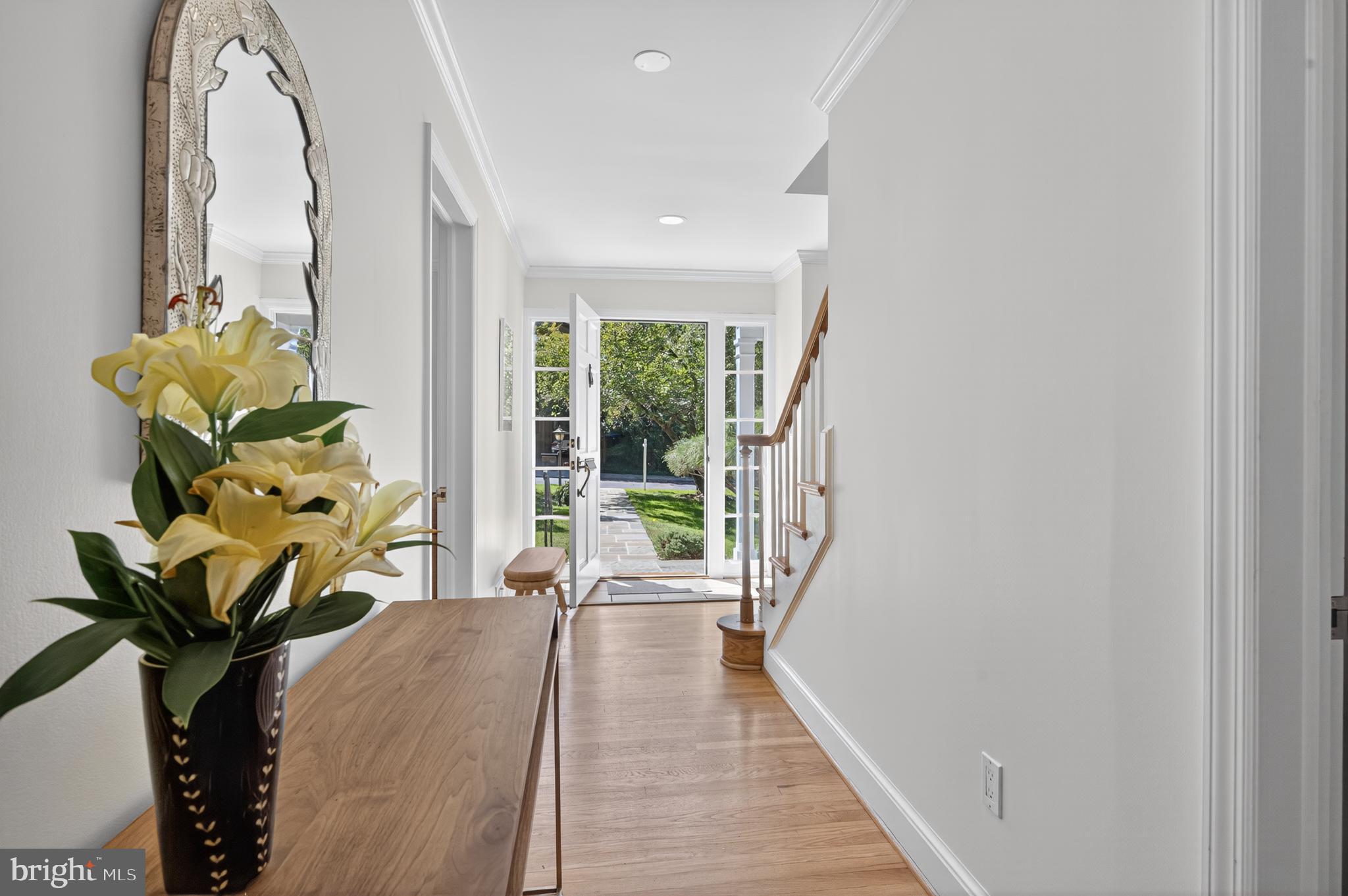 3137 Aberfoyle Place Northwest Washington, DC 20015 - Photo 7 of 85 a living room with furniture and a floor to ceiling window