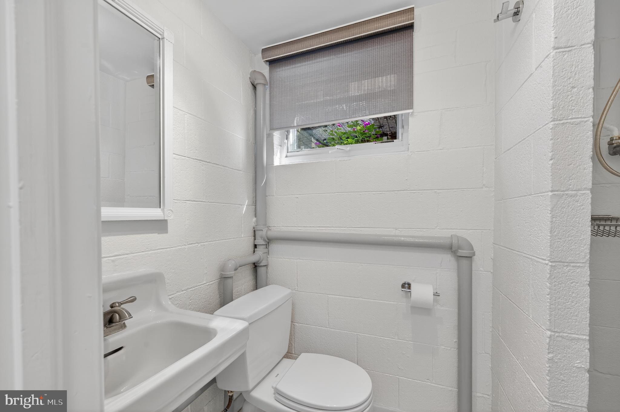 3137 Aberfoyle Place Northwest Washington, DC 20015 - Photo 70 of 85 a bathroom with a sink and toilet