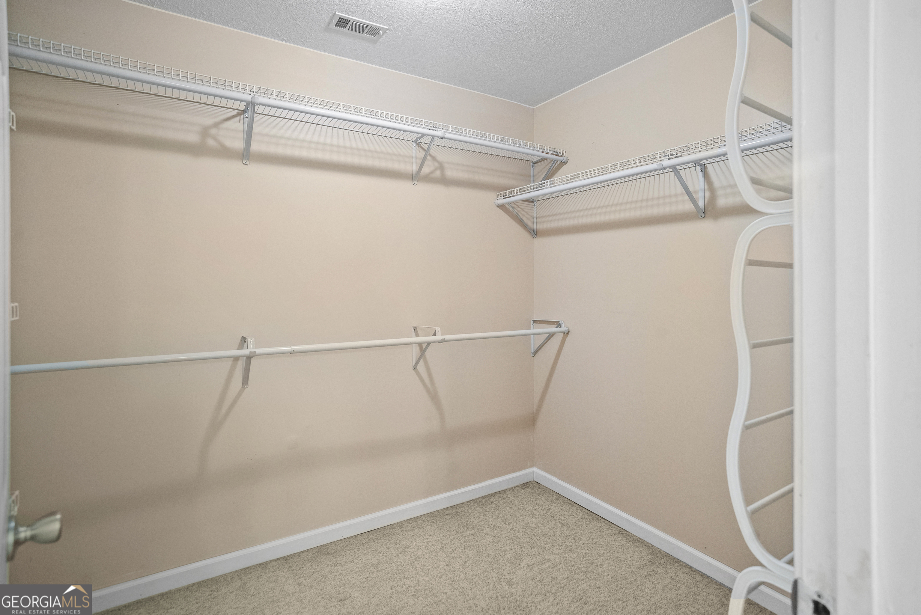 101 Ridge Drive Claxton, GA 30417 - Photo 13 of 30 a view of a room with racks on the wall