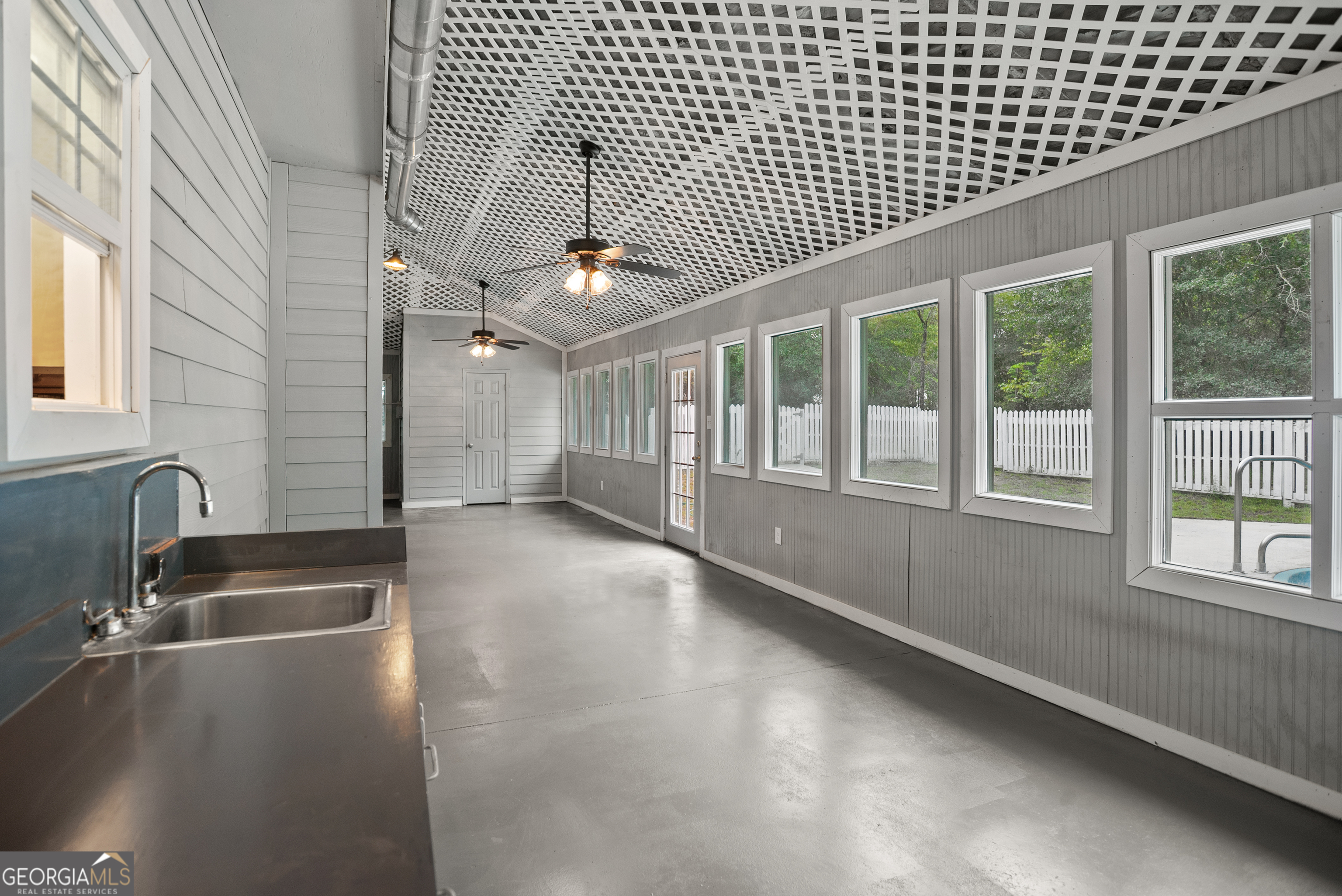 101 Ridge Drive Claxton, GA 30417 - Photo 26 of 30 a view of an empty room with a window