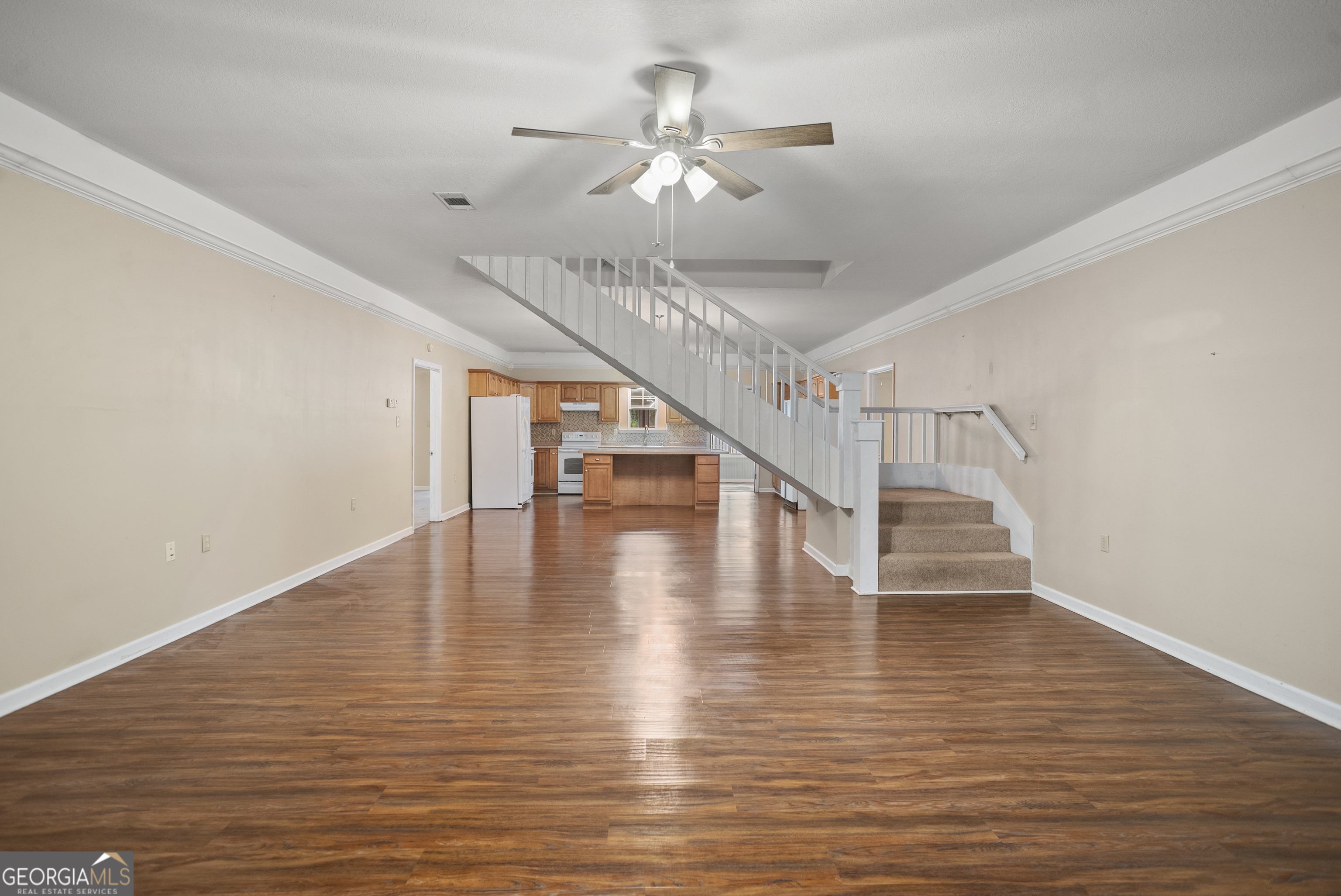 101 Ridge Drive Claxton, GA 30417 - Photo 5 of 30 a view of entryway and hall with wooden floor