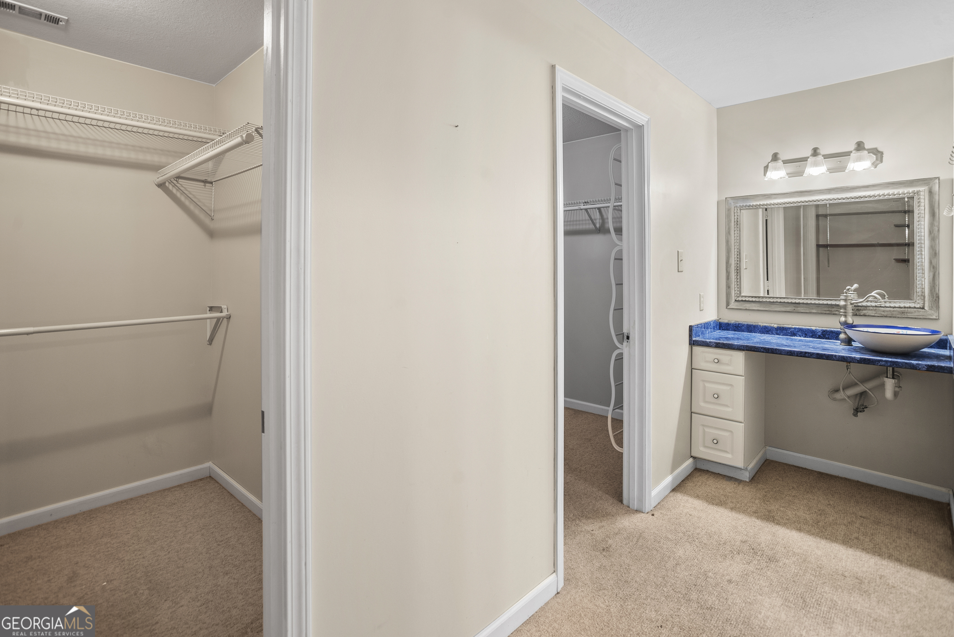 101 Ridge Drive Claxton, GA 30417 - Photo 10 of 30 a view of cabinets a sink and dishwasher in a room