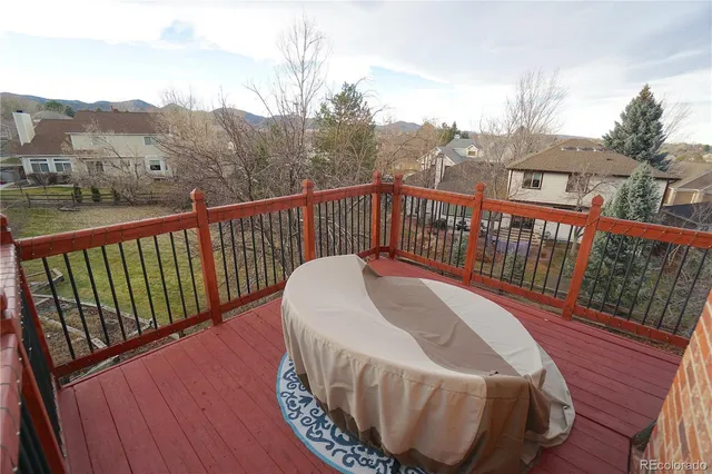a view of a balcony with a chair