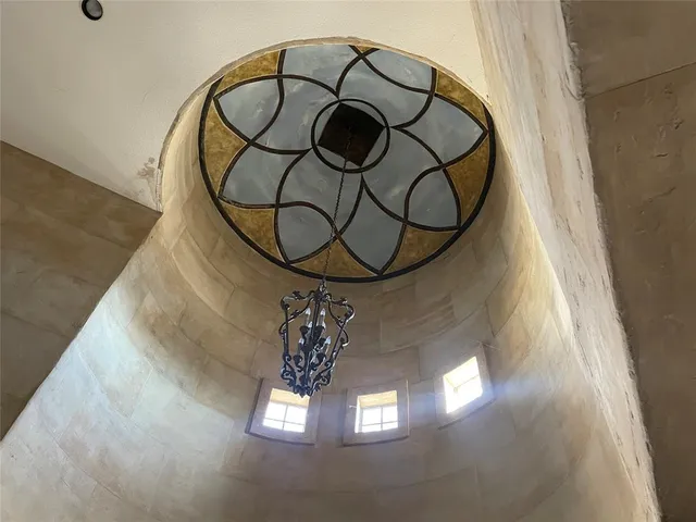 a close view of light fixtures and staircase