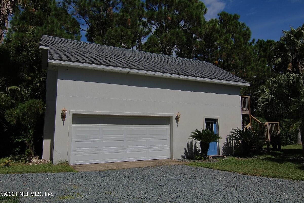1365 Highway 206 St. Augustine, FL 32086 - Photo 34 of 54 a view of house with garage and yard
