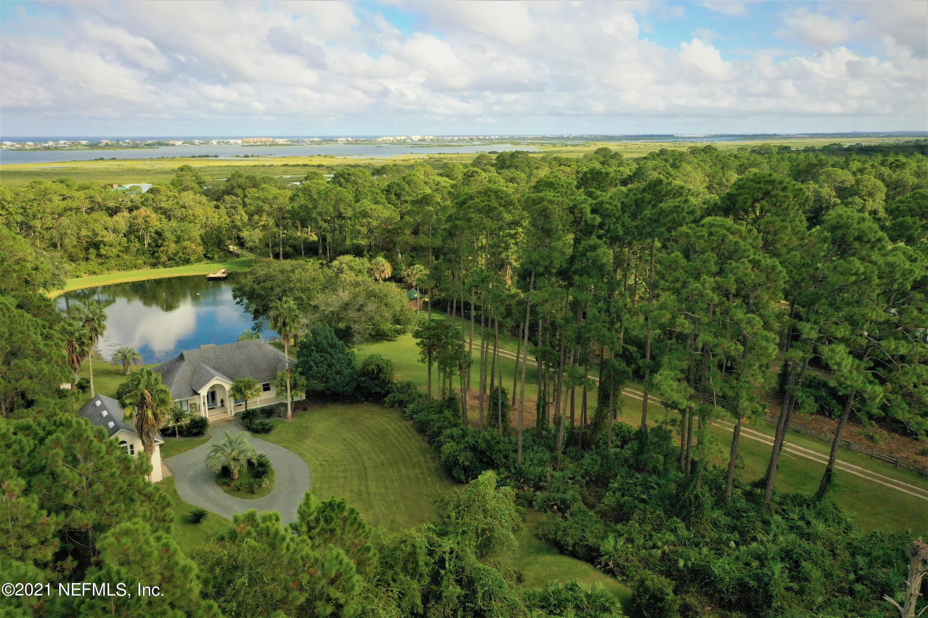 1365 Highway 206 St. Augustine, FL 32086 - Photo 52 of 54 a view of a lake with a yard