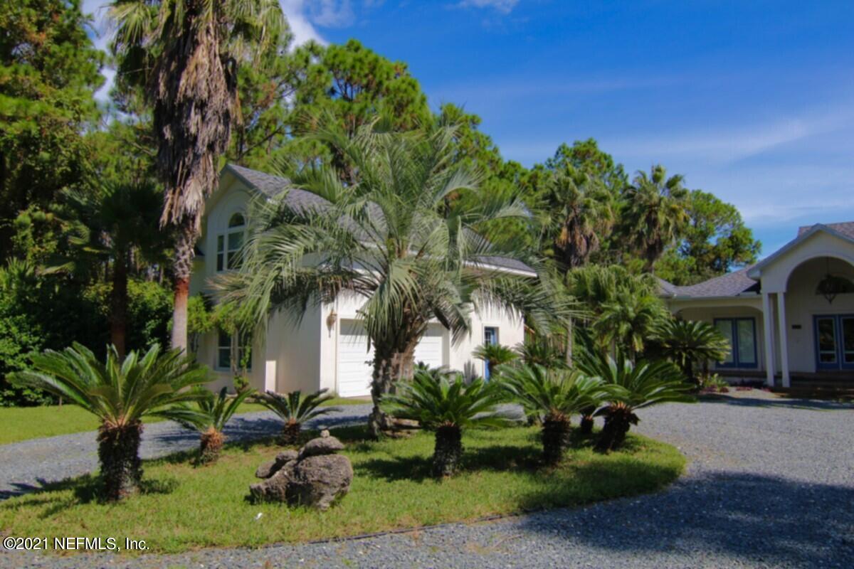 1365 Highway 206 St. Augustine, FL 32086 - Photo 8 of 54 a front view of a house with a yard