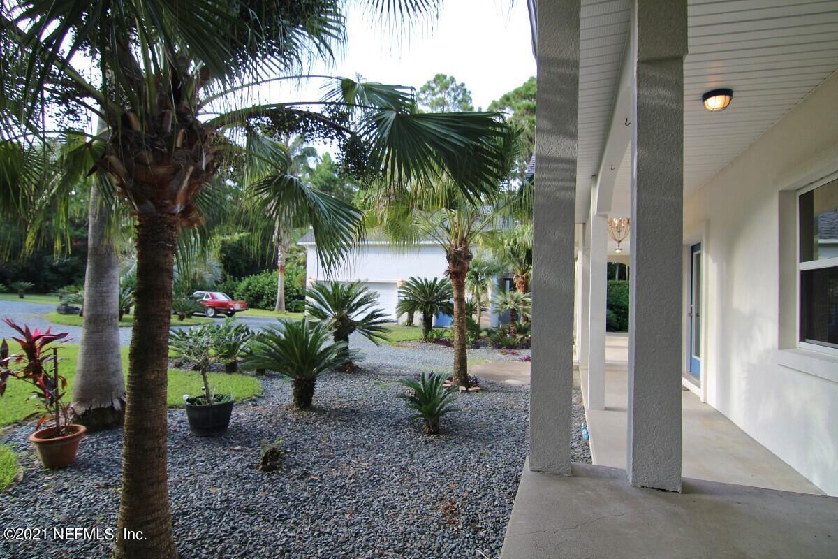 1365 Highway 206 St. Augustine, FL 32086 - Photo 9 of 54 a plant is in front of a house