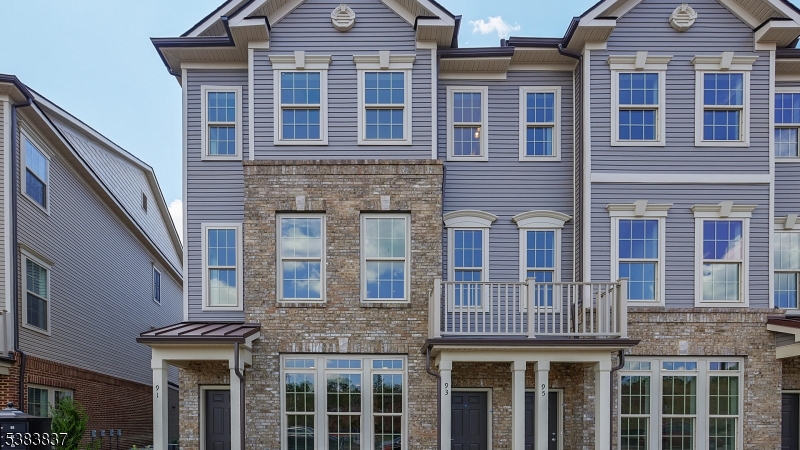 a front view of a building with glass windows
