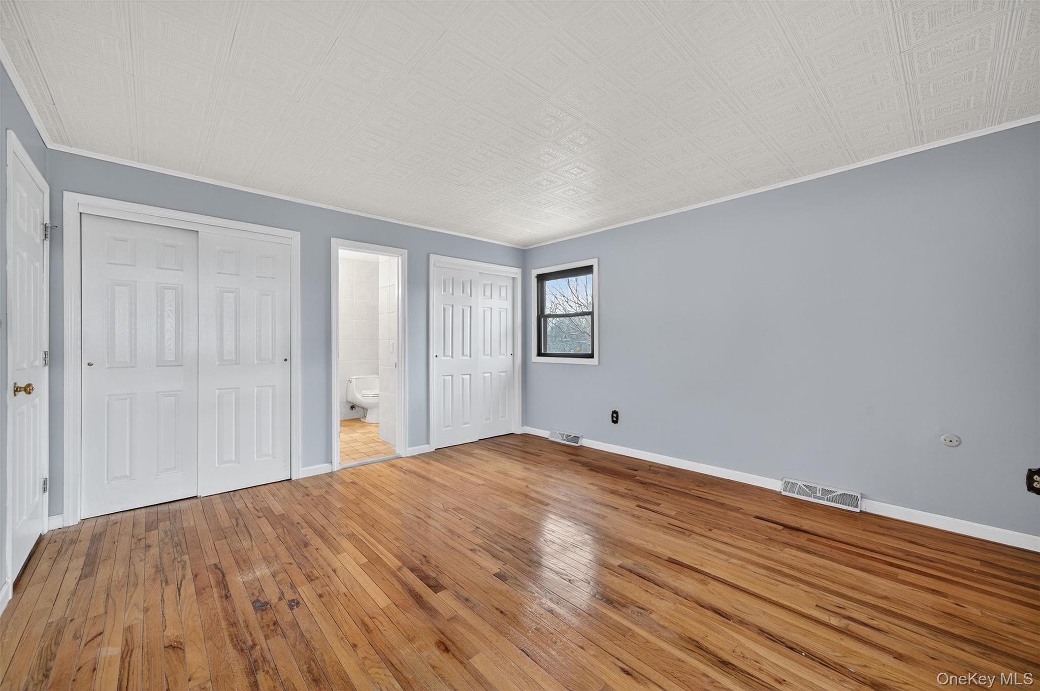 8 Badami Drive Middletown, NY 10941 - Photo 19 of 42 a view of empty room with wooden floor