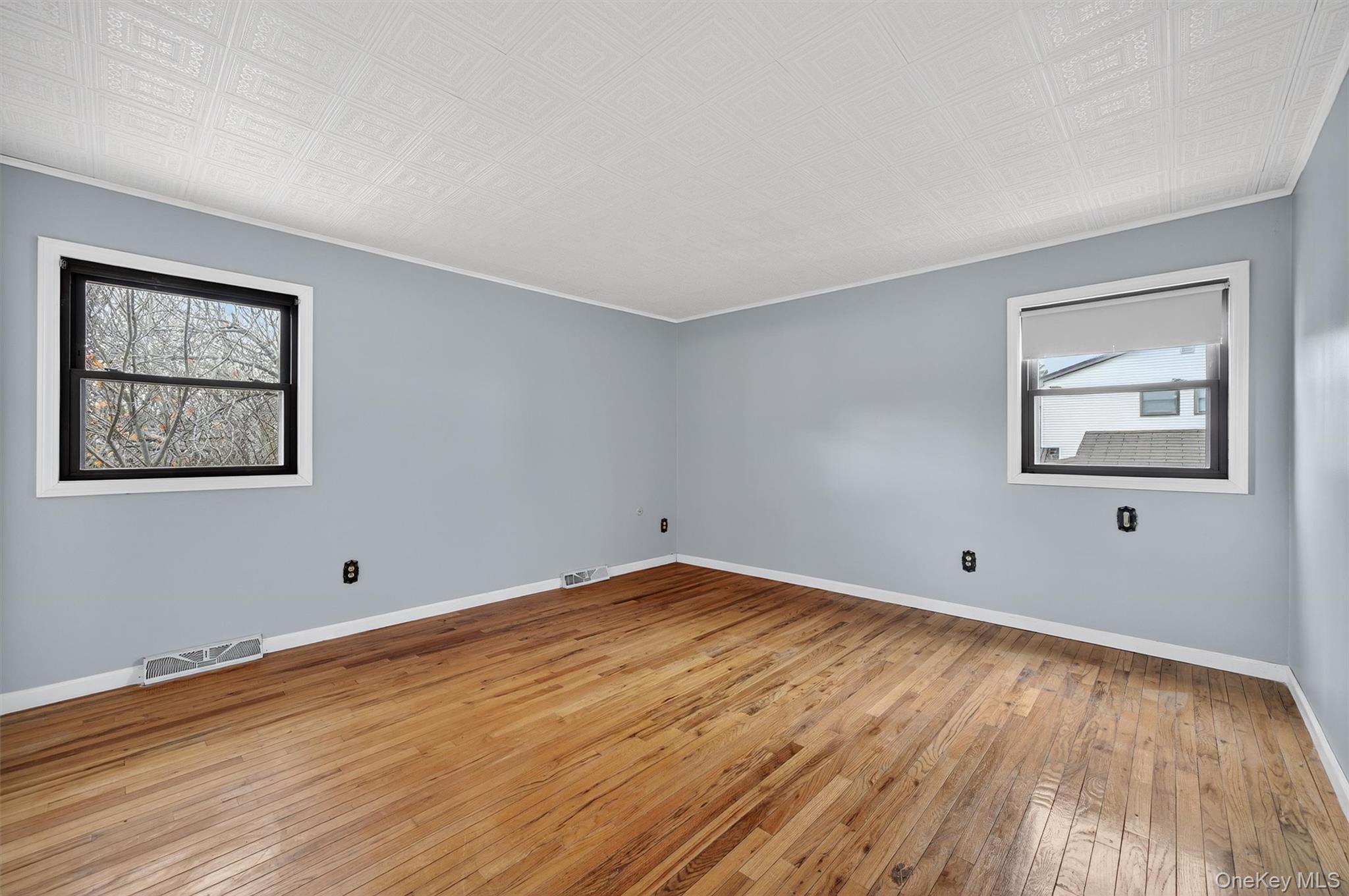 8 Badami Drive Middletown, NY 10941 - Photo 20 of 42 a view of empty room with wooden floor and fan