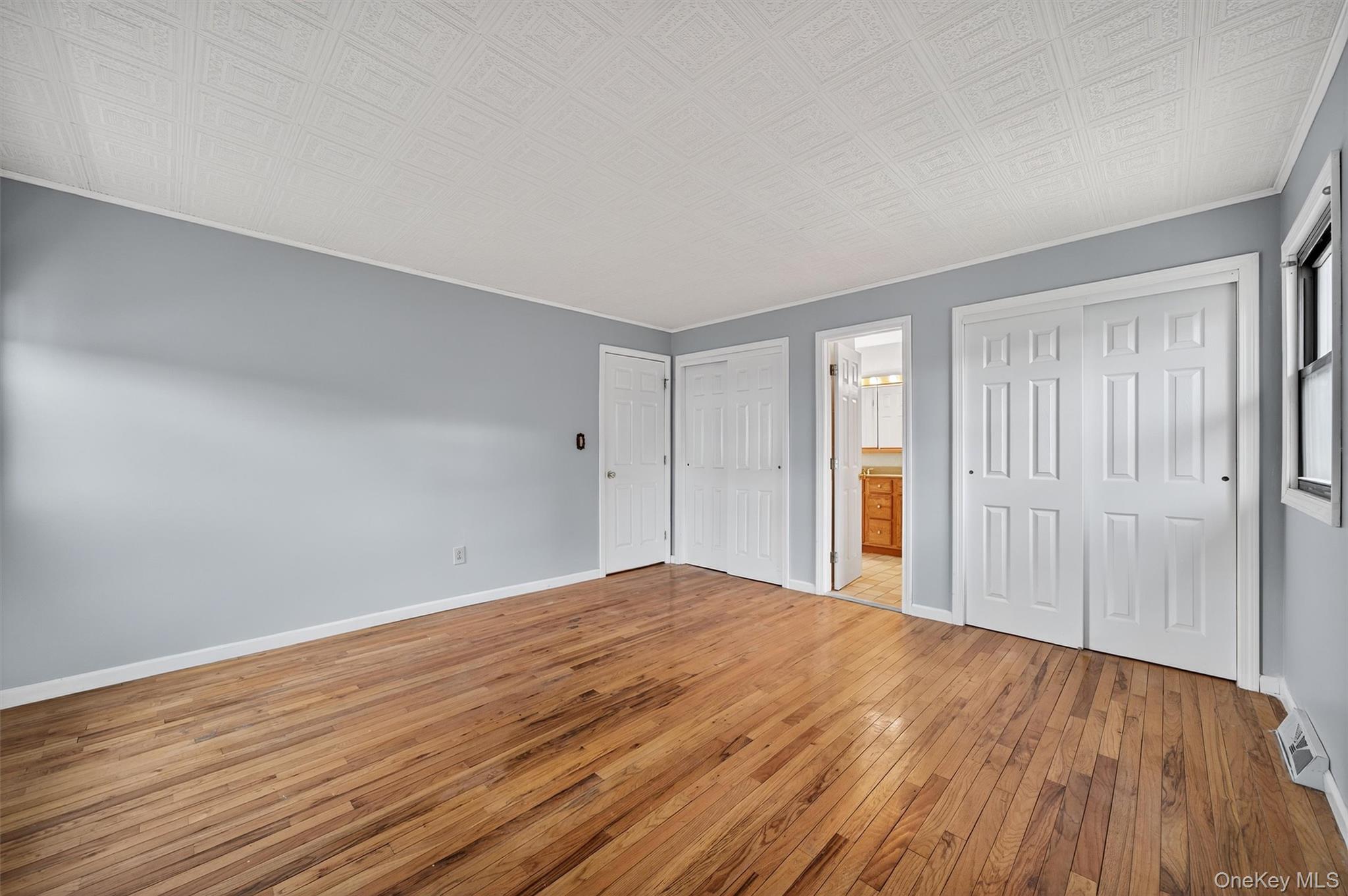 8 Badami Drive Middletown, NY 10941 - Photo 21 of 42 a view of empty room with wooden floor