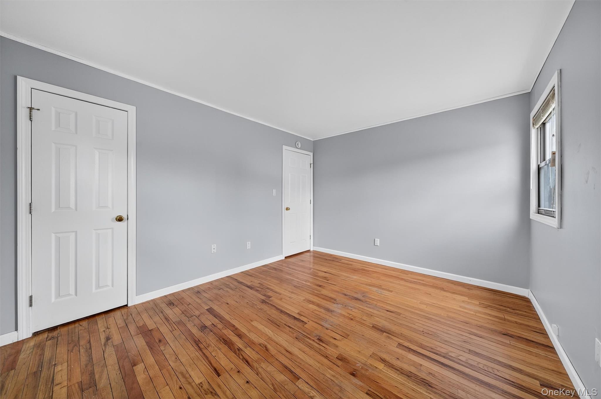 8 Badami Drive Middletown, NY 10941 - Photo 24 of 42 a view of an empty room with wooden floor