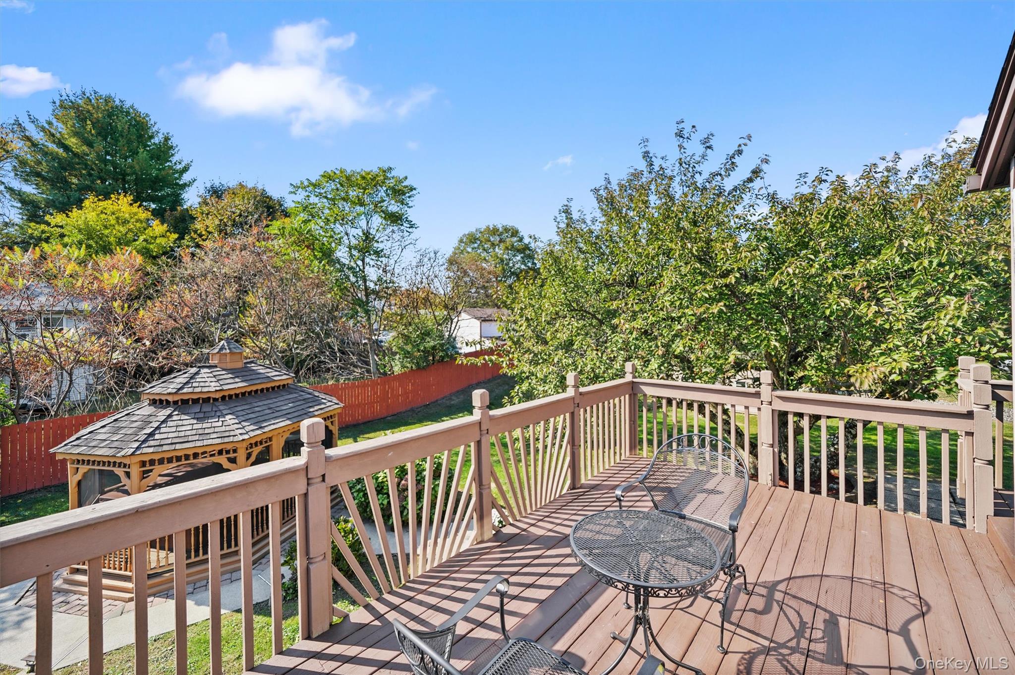 8 Badami Drive Middletown, NY 10941 - Photo 36 of 42 a view of a balcony with wooden floor and outdoor seating