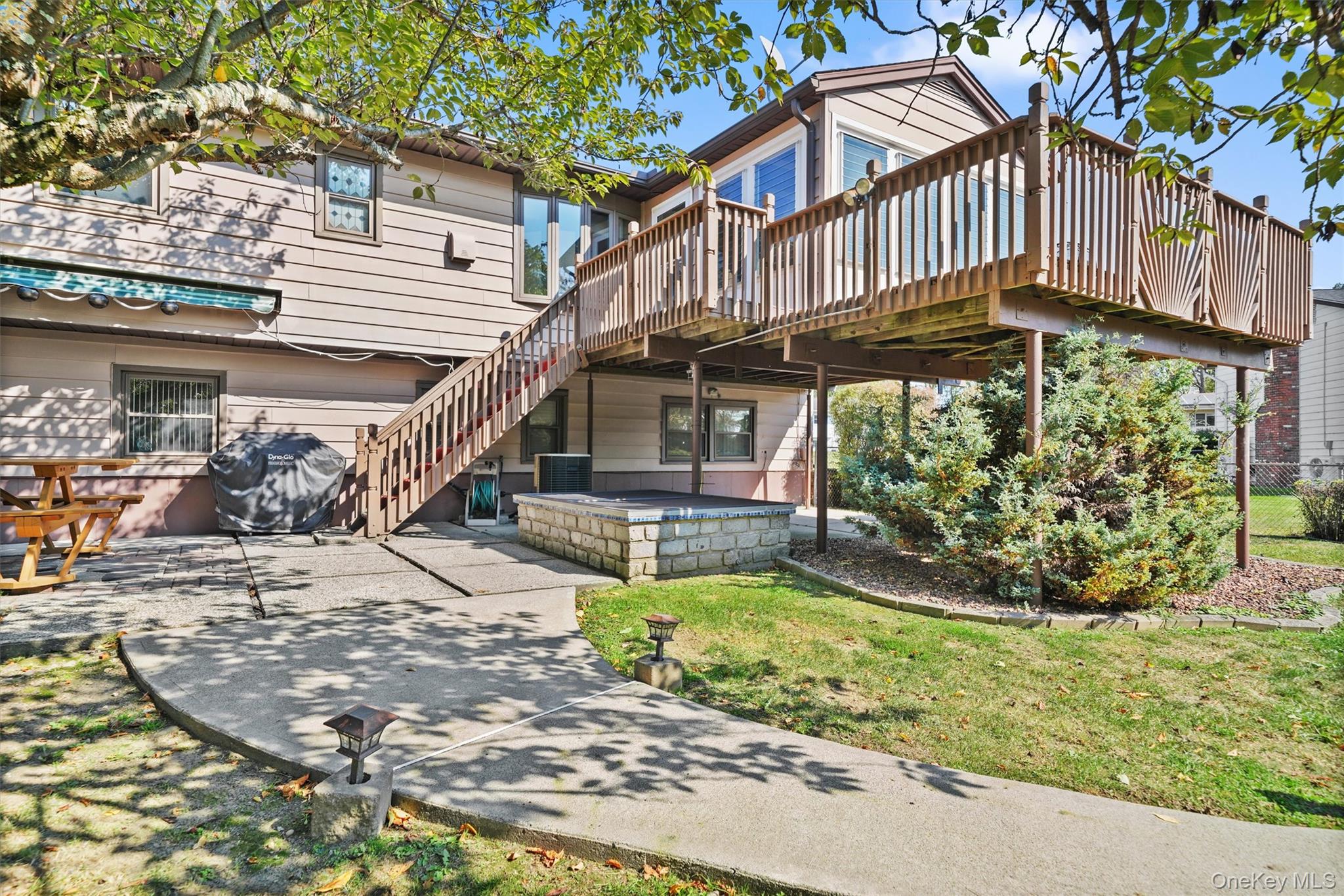 8 Badami Drive Middletown, NY 10941 - Photo 37 of 42 a view of a house with a small yard plants and large trees
