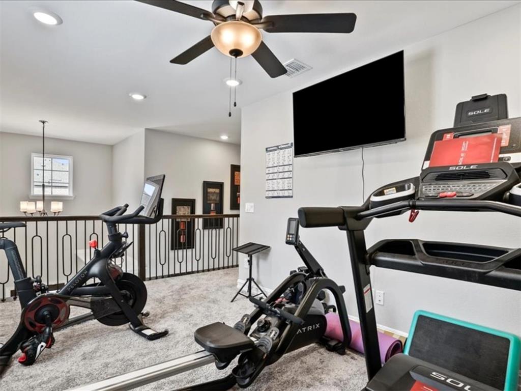 4828 Nicola Road Dallas, TX 75228 - Photo 19 of 38 a view of a room with gym equipment