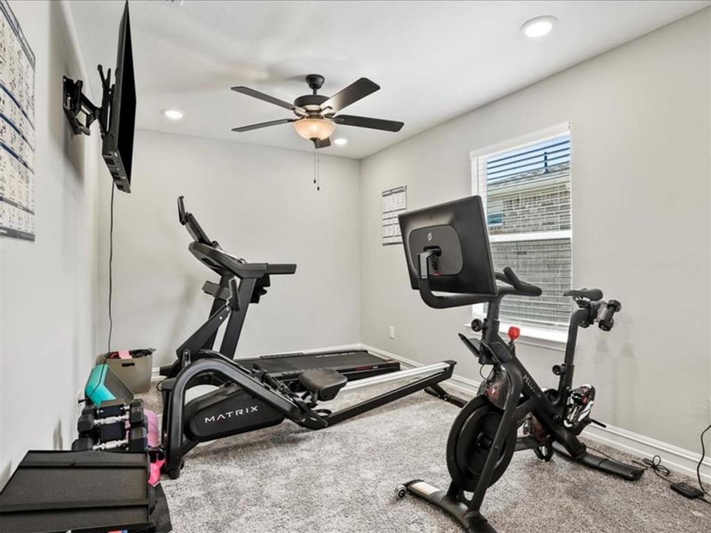 4828 Nicola Road Dallas, TX 75228 - Photo 20 of 38 a view of a room with gym equipment