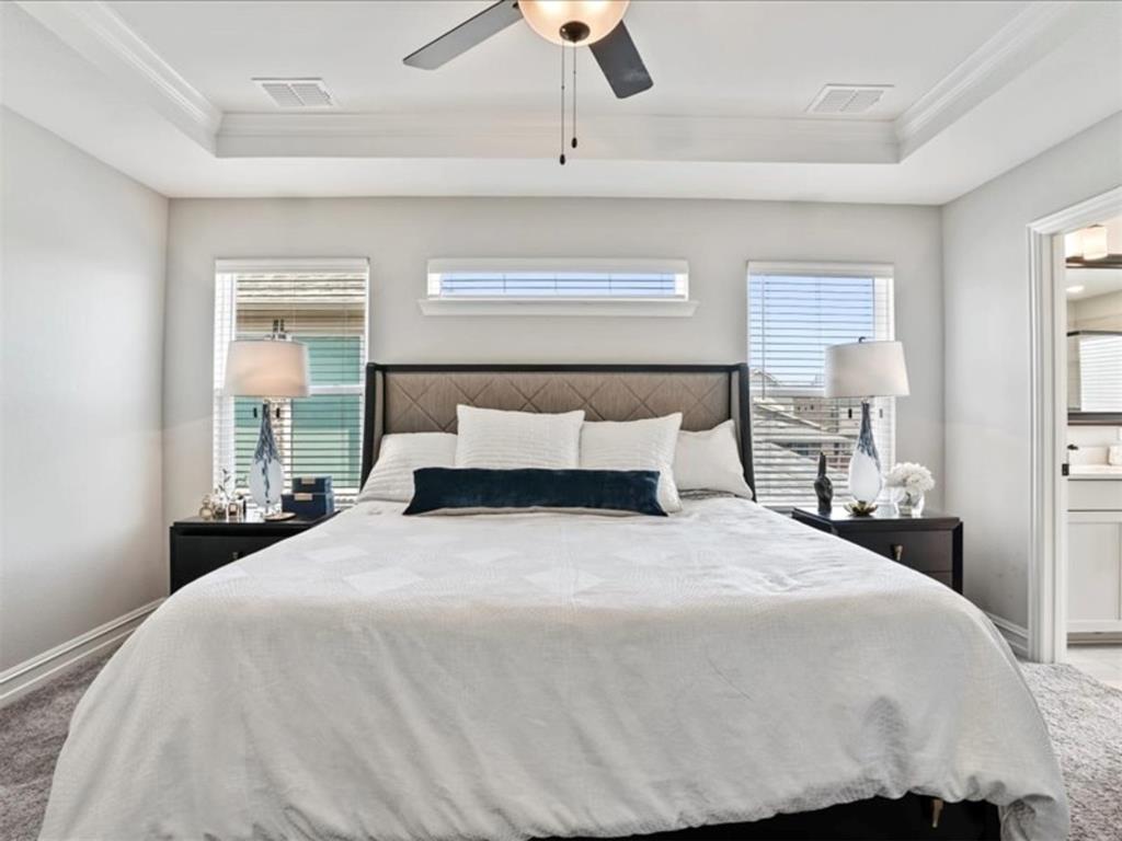 4828 Nicola Road Dallas, TX 75228 - Photo 22 of 38 a bedroom with a bed and window