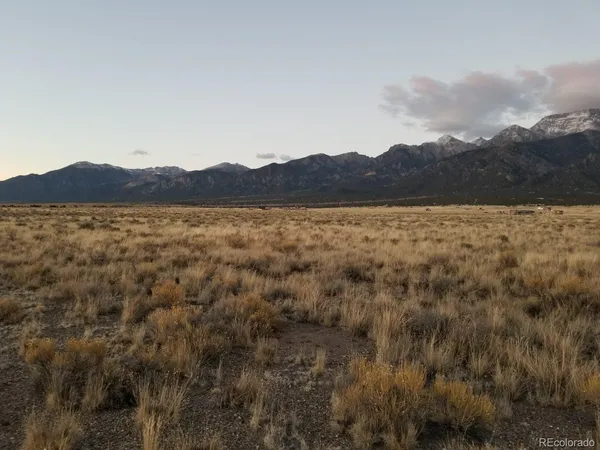 a view of an outdoor space and mountain view