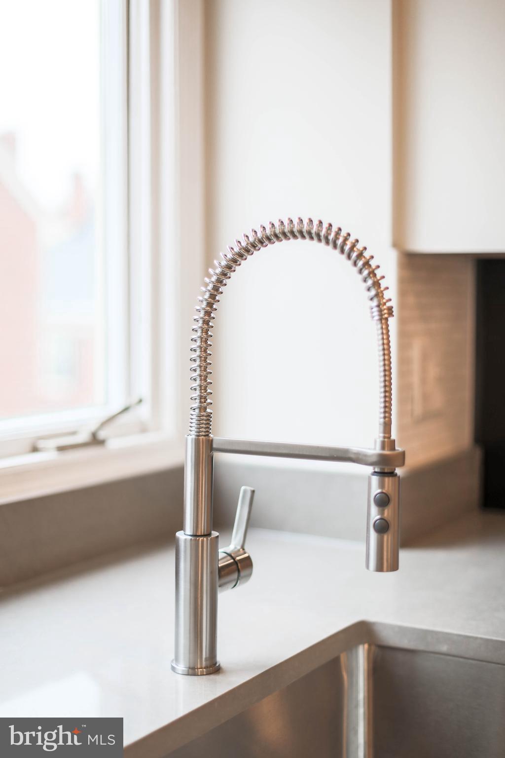 1243 Portner Road Alexandria, VA 22314 - Photo 17 of 53 Single-handle coil sprint neck faucet