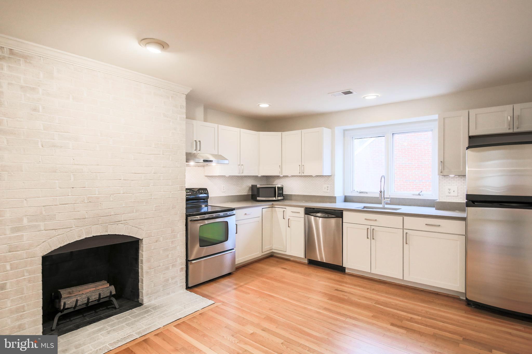 1243 Portner Road Alexandria, VA 22314 - Photo 18 of 53 Marble mini-brick backsplash