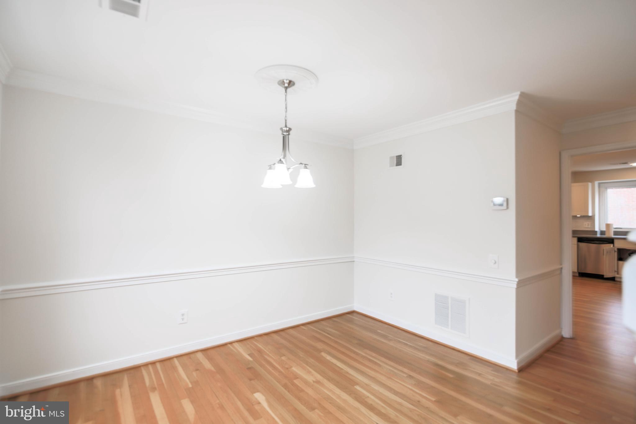 1243 Portner Road Alexandria, VA 22314 - Photo 25 of 53 Gleaming hardwood floors in dining room