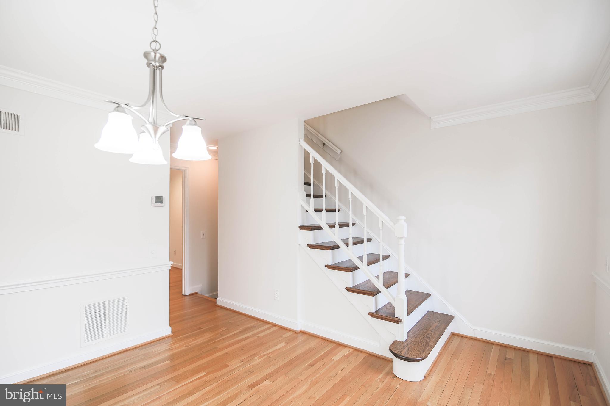 1243 Portner Road Alexandria, VA 22314 - Photo 26 of 53 Stairway to third floor located in dining room