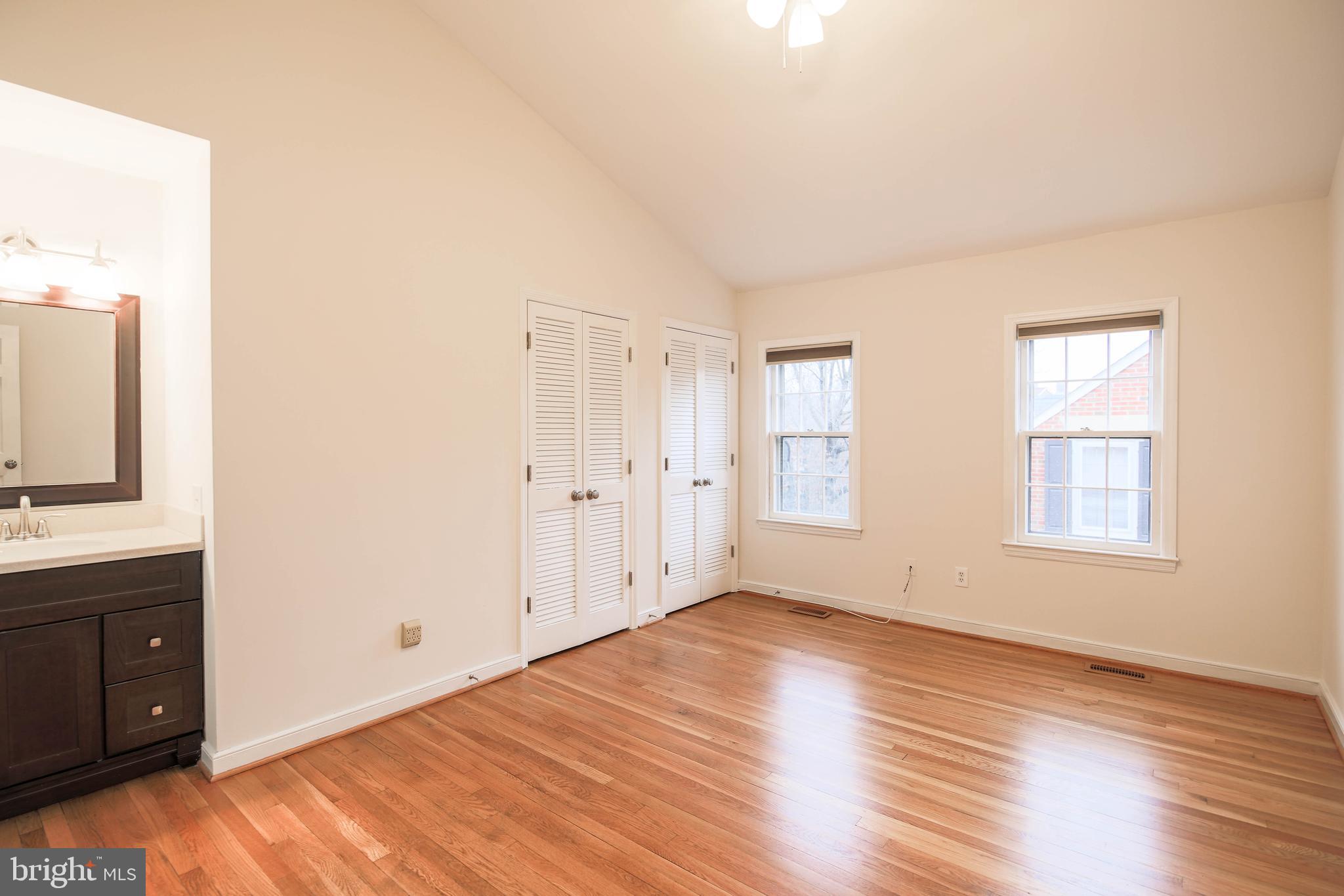 1243 Portner Road Alexandria, VA 22314 - Photo 30 of 53 Expansive primary bedroom has lofted ceilings