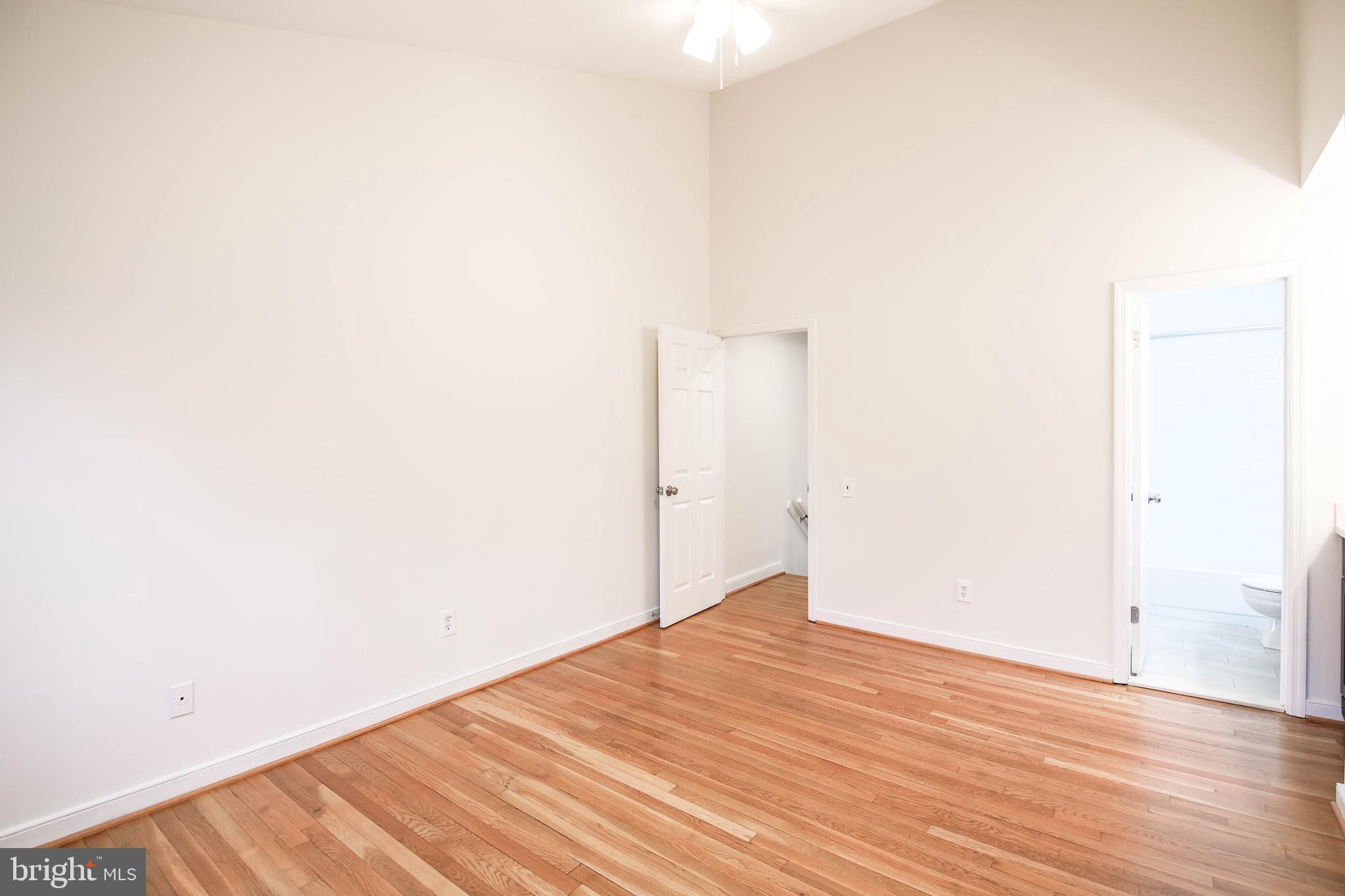 1243 Portner Road Alexandria, VA 22314 - Photo 32 of 53 Gleaming hardwood floors in primary bedroom