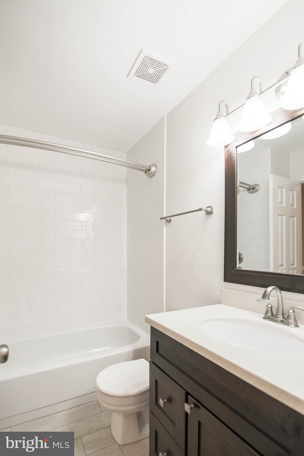 1243 Portner Road Alexandria, VA 22314 - Photo 34 of 53 Newly renovated upper-level bath with new tile