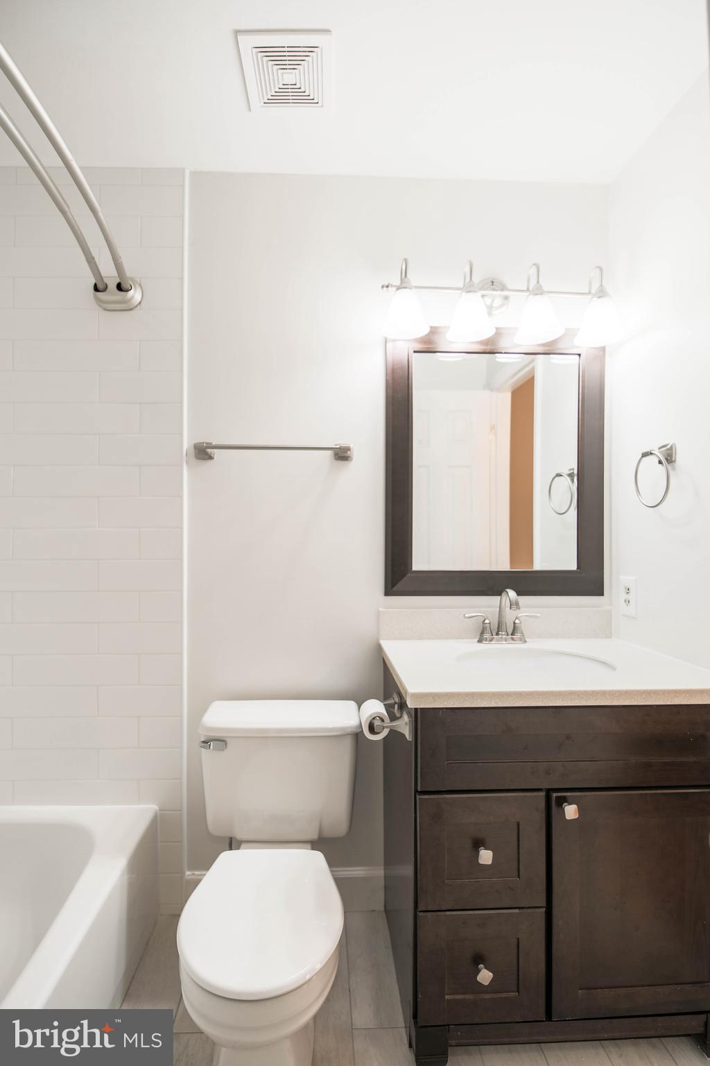 1243 Portner Road Alexandria, VA 22314 - Photo 35 of 53 New bath hardware and second vanity