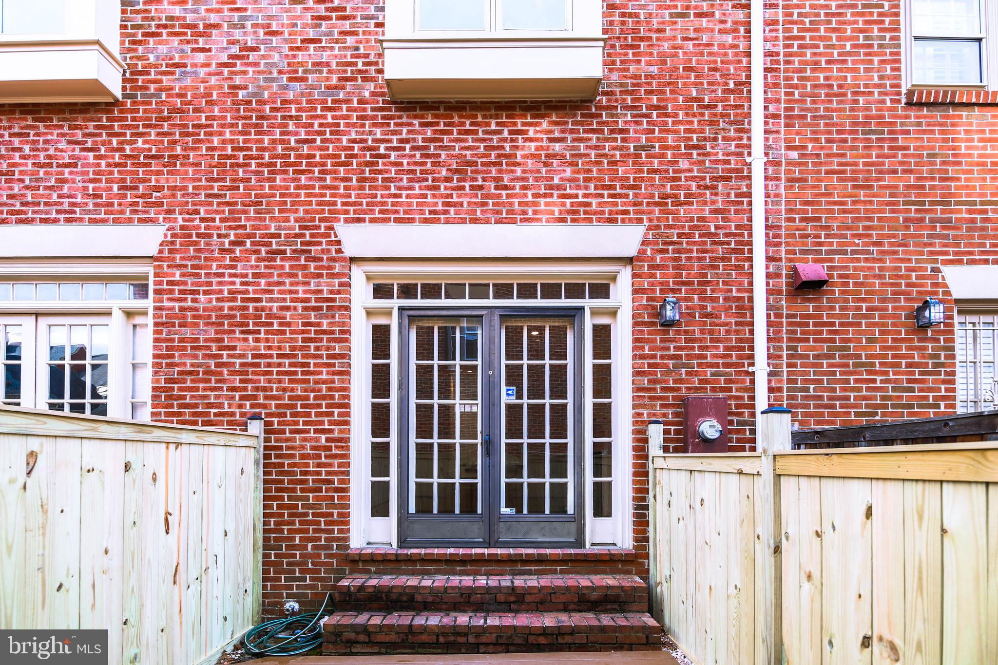1243 Portner Road Alexandria, VA 22314 - Photo 51 of 53 French doors from patio lead into living room