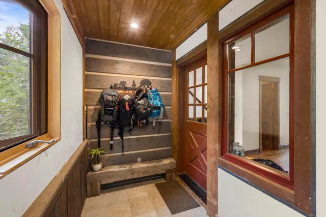 a bedroom with furniture and a window