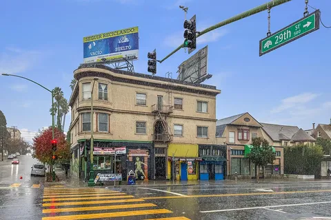 a view of a building with a street