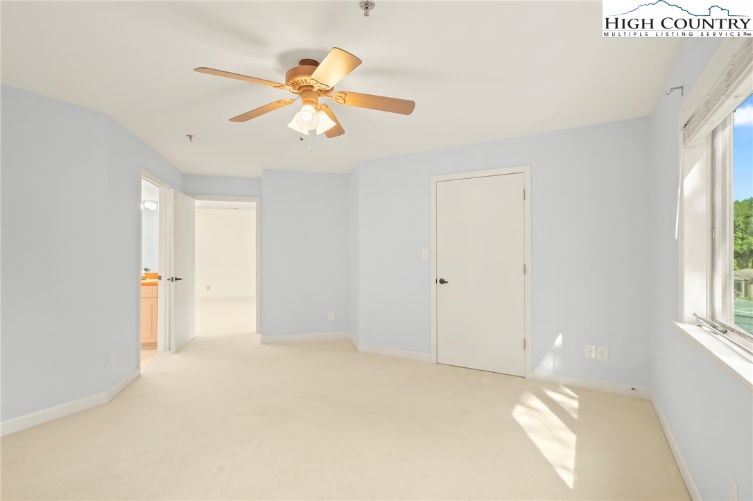 151 Deer Valley Drive, Unit 225 Boone, NC 28607 - Photo 13 of 31 a view of an empty room with a window