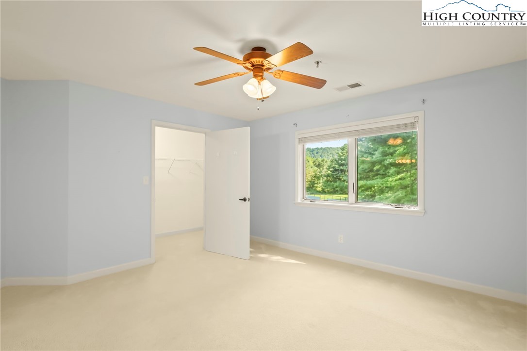 151 Deer Valley Drive, Unit 225 Boone, NC 28607 - Photo 15 of 31 a view of an empty room with a window