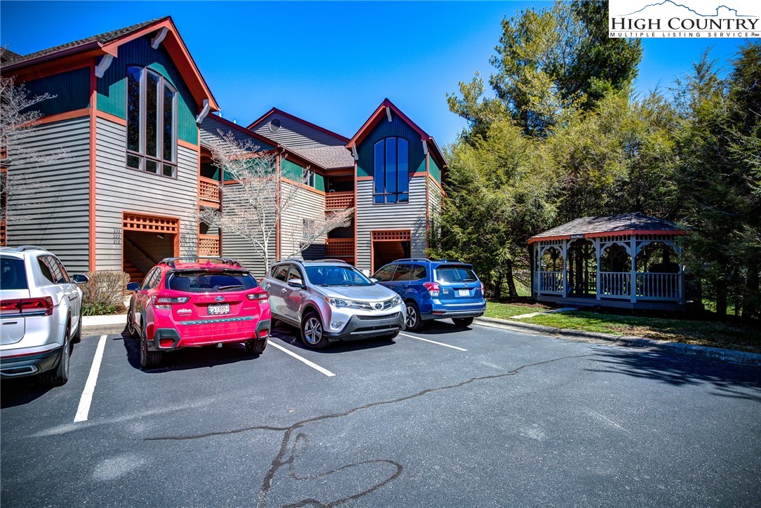 151 Deer Valley Drive, Unit 225 Boone, NC 28607 - Photo 2 of 31 a car parked in front of a house
