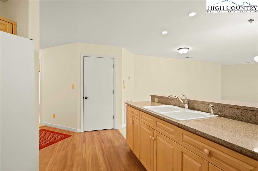 151 Deer Valley Drive, Unit 225 Boone, NC 28607 - Photo 22 of 31 a bathroom with a sink and a mirror