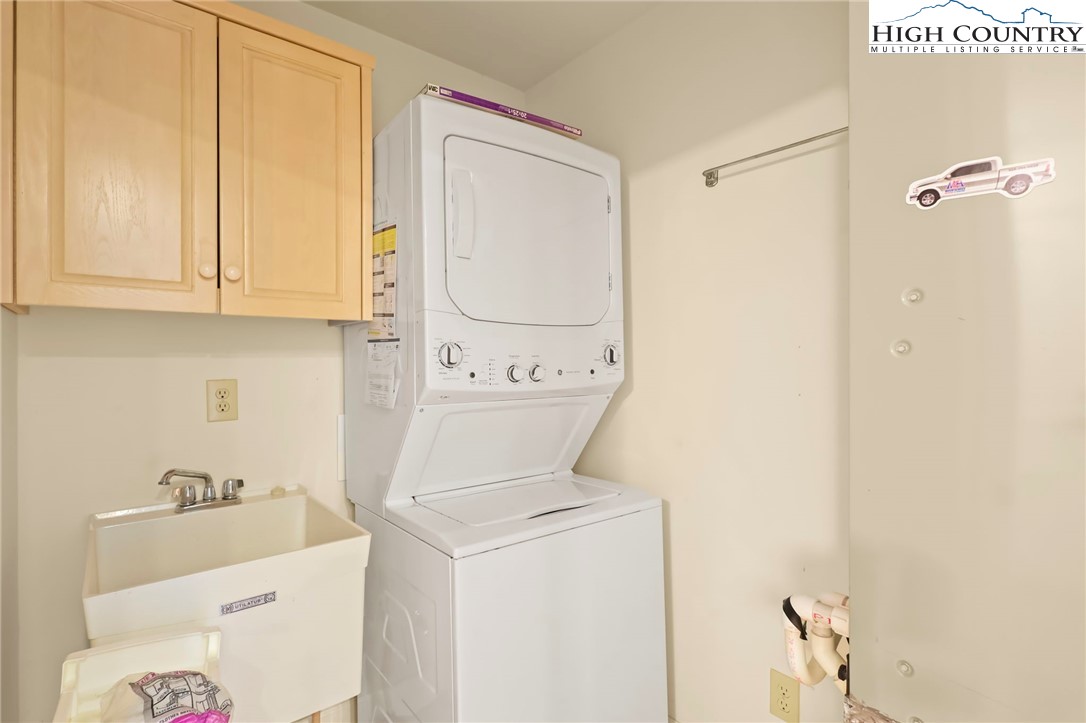 151 Deer Valley Drive, Unit 225 Boone, NC 28607 - Photo 30 of 31 a utility room with dryer and washer