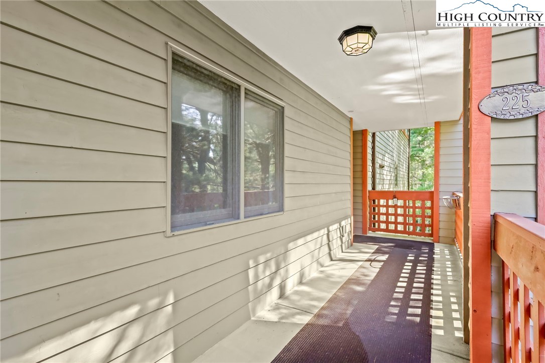 151 Deer Valley Drive, Unit 225 Boone, NC 28607 - Photo 6 of 31 a view of a balcony with wooden floor